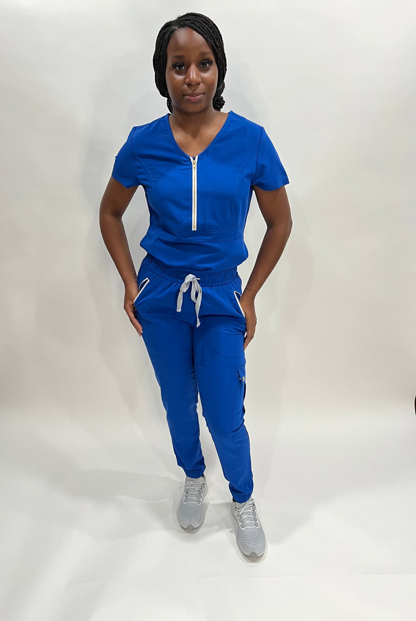Coffee Street Apparel's "Ellen" Women's Scrub set comes in Royal Blue and Burgundy High Quality TRS Fabric 72% Polyester 21%Rayon 7% Spandex Soft, Light, Comfortable, 4 way stretch.