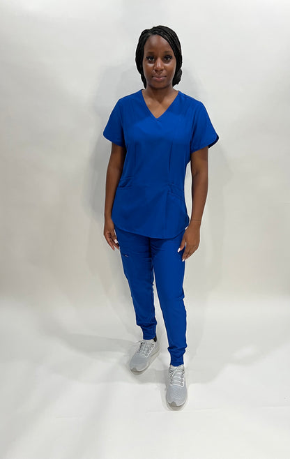 Coffee Street Apparel's "Eva" Women's Scrub set comes in Royal Blue and Burgundy High Quality TS Fabric 94% Polyester  6% Spandex  Soft, silky, light,  4 way stretch , antibacterial, anti wrinkle, quick dry, anti-static, anti absorbent.